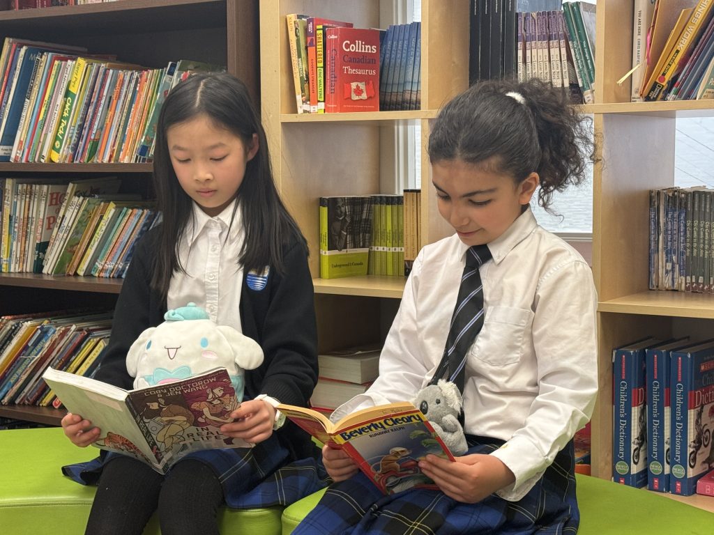 Students learning in small class private elementary school Vancouver