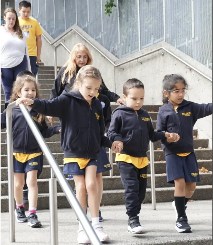 Private elementary school classroom in downtown Vancouver with teacher and students